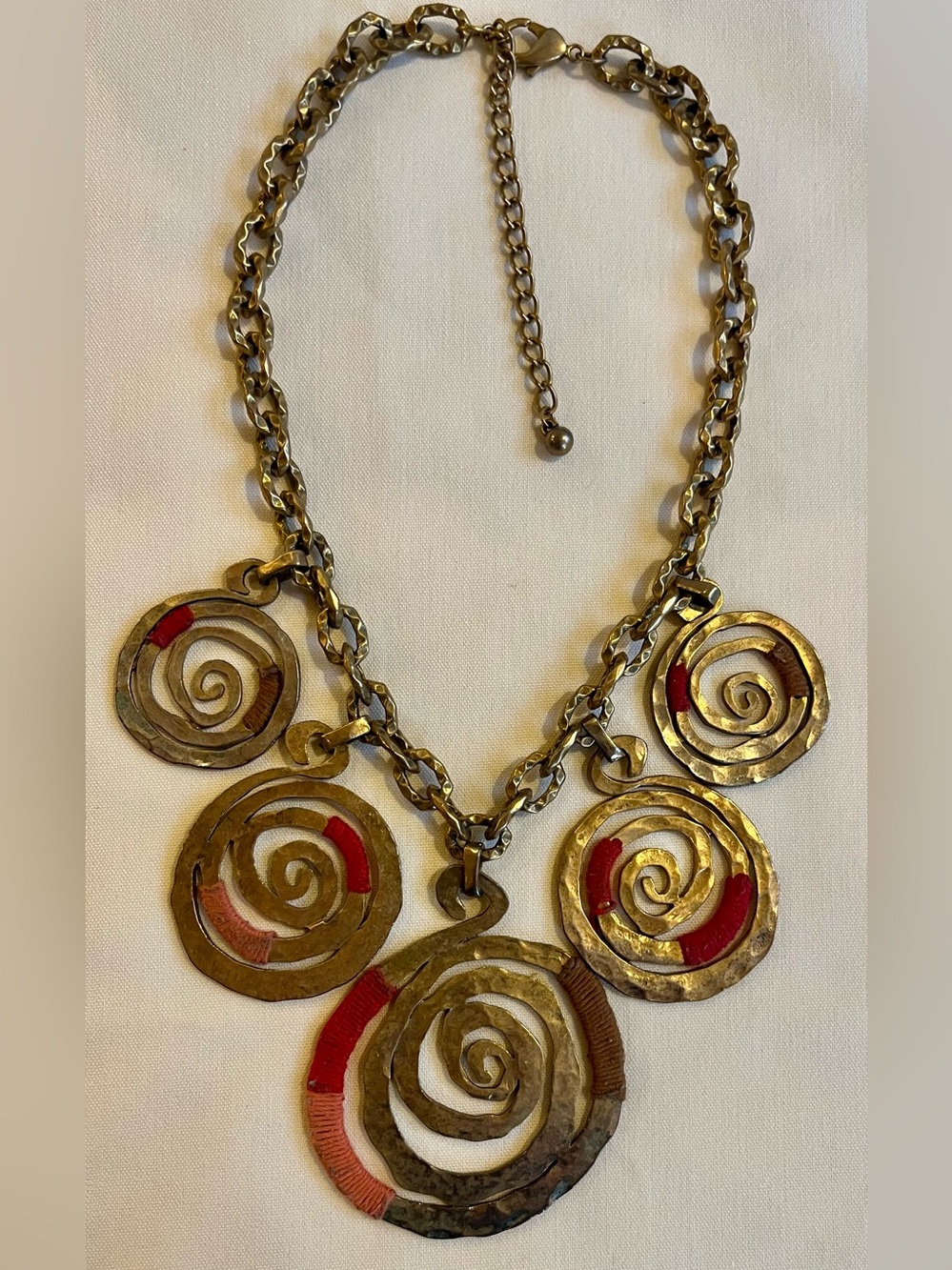 Gold Spiral Necklace with Orange Detail